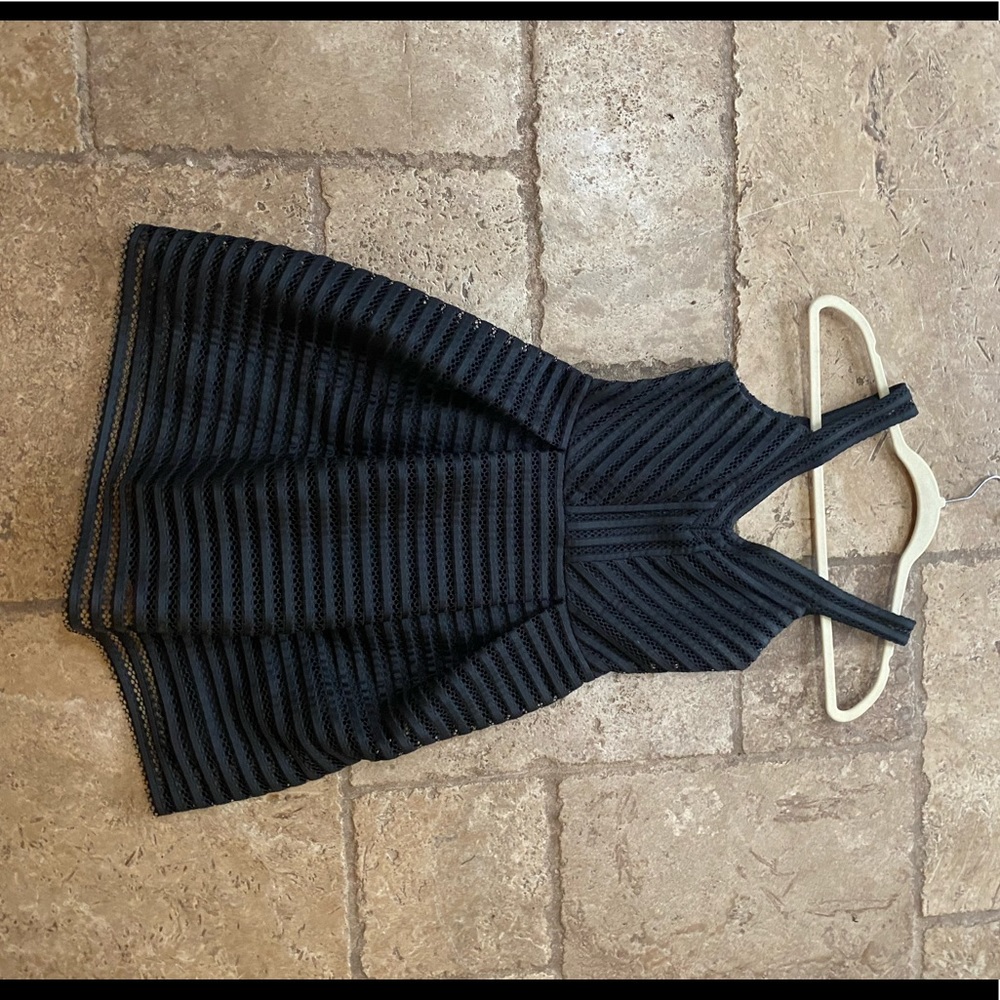 Mini black peplum dress